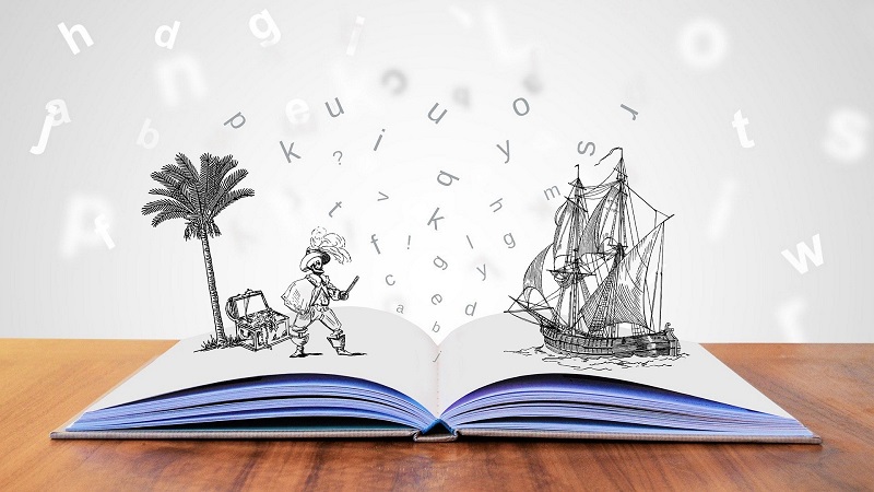 book with illustration of pirate, treasure, and ship