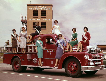 women on a fire truck
