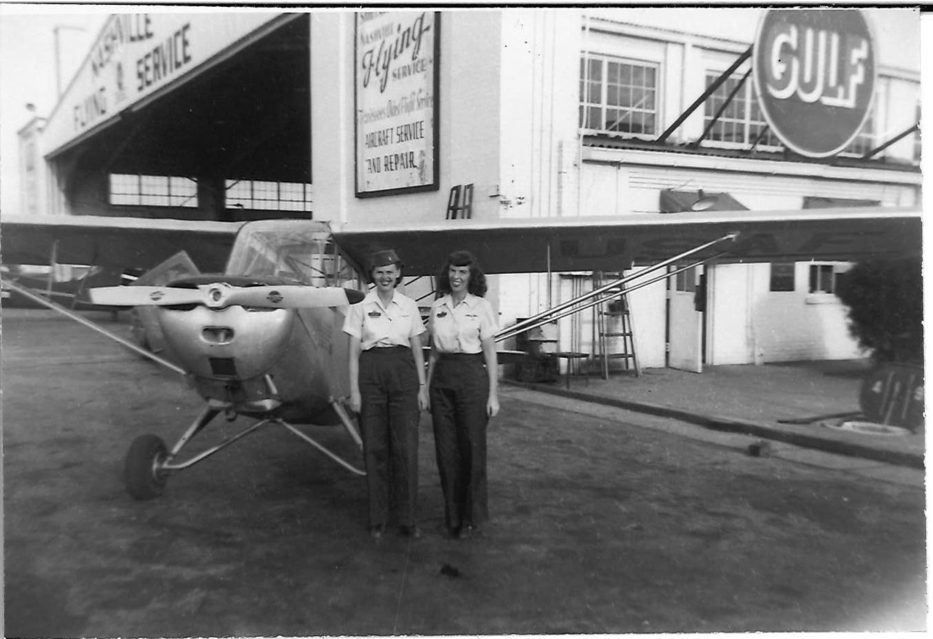 Georgianna McConnell with friend, at the Nashville Flying Service hangar at BNA