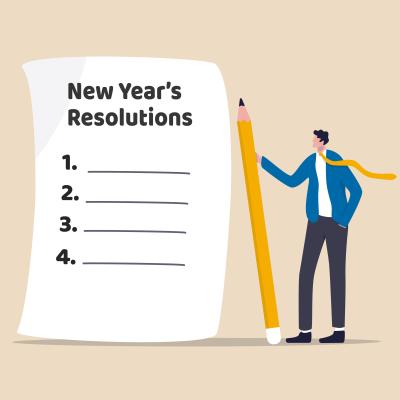 Man with list of New Year's Resolutions