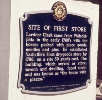 Sign marking location of the first store on 2nd Ave 