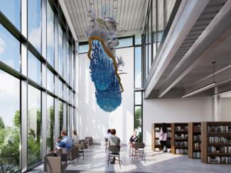 sculpture suspended in a two-story space