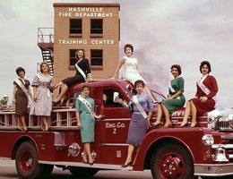 Photo of women in a fire truck at the NFD training center